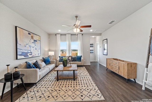 9302 Graze Land Dr, San Antonio, TX 78211 - living room featuring ceiling fan, dark wood-style floors, recessed lighting, and baseboards