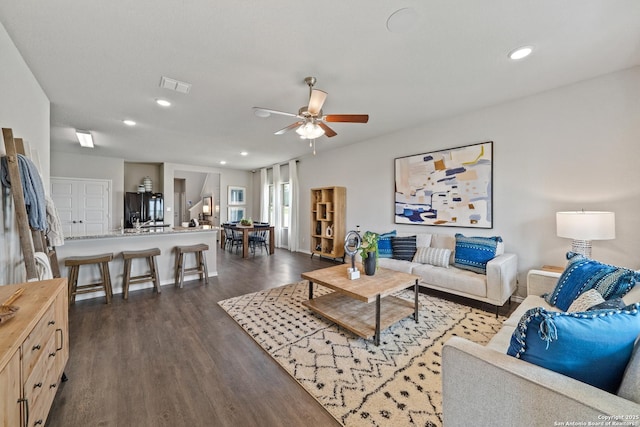 9302 Graze Land Dr, San Antonio, TX 78211 - living room featuring dark wood-type flooring, ceiling fan, and recessed lighting
