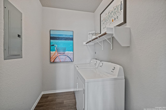 9302 Graze Land Dr, San Antonio, TX 78211 - laundry area featuring electric panel, independent washer and dryer, dark wood-style floors, baseboards, and a textured ceiling