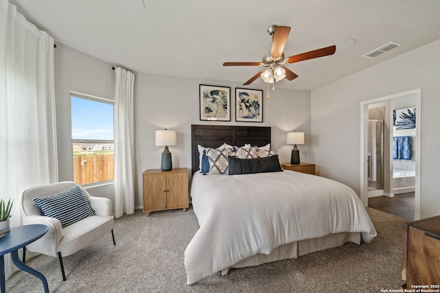 9302 Graze Land Dr, San Antonio, TX 78211 - bedroom with carpet flooring, ensuite bath, ceiling fan, and baseboards