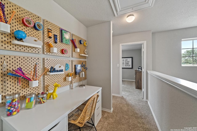 9302 Graze Land Dr, San Antonio, TX 78211 - office featuring light carpet, a textured ceiling, baseboards, and attic access