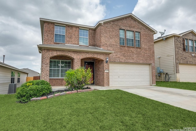 10907 Shoo Fly, San Antonio, TX 78245 - traditional-style house with brick siding, an attached garage, concrete driveway, and a front yard