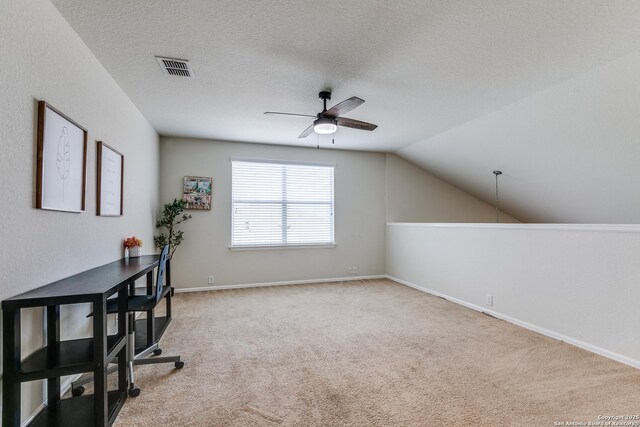 10907 Shoo Fly, San Antonio, TX 78245 - unfurnished office featuring ceiling fan, carpet flooring, lofted ceiling, and a textured ceiling