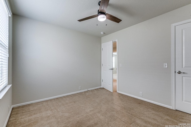 10907 Shoo Fly, San Antonio, TX 78245 - carpeted spare room with a ceiling fan and baseboards