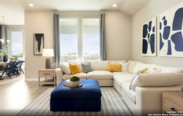 6515 Morgan Gln, San Antonio, TX 78253 - living room featuring wood finished floors, recessed lighting, a chandelier, and vaulted ceiling