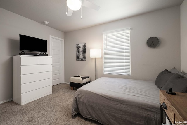 604 Saxon, Seguin, TX 78155 - bedroom with carpet floors, baseboards, and ceiling fan