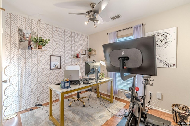 9215 Hilltop Xing, San Antonio, TX 78251 - office space with baseboards, wallpapered walls, a ceiling fan, plenty of natural light, and wood finished floors