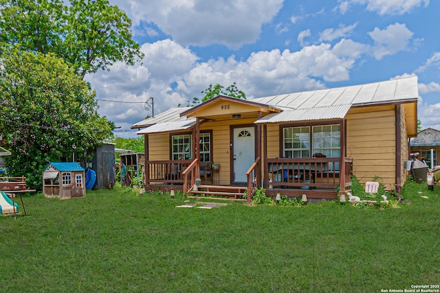 935 Gembler, San Antonio, TX 78219 - bungalow-style house featuring a front yard, metal roof, and a porch