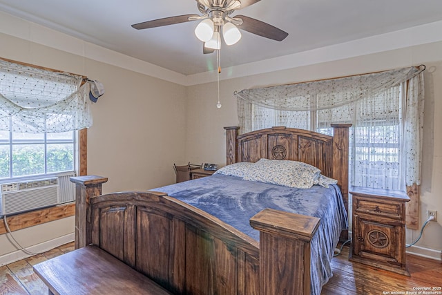 935 Gembler, San Antonio, TX 78219 - bedroom with hardwood / wood-style floors, baseboards, cooling unit, and a ceiling fan