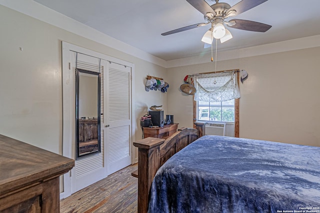 935 Gembler, San Antonio, TX 78219 - bedroom with wood finished floors, cooling unit, a ceiling fan, and a closet