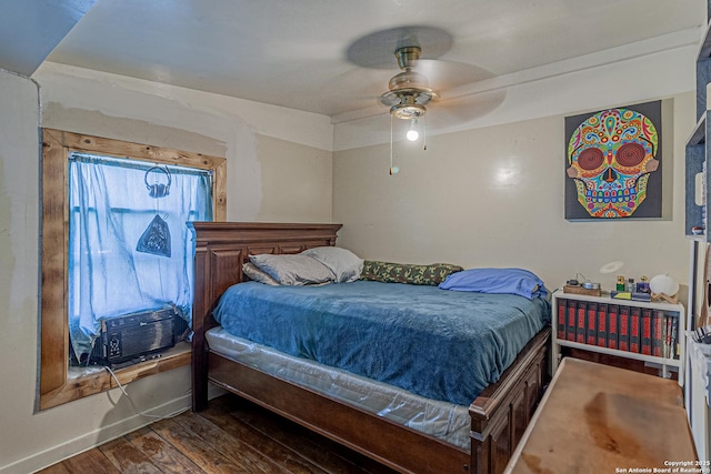 935 Gembler, San Antonio, TX 78219 - bedroom featuring wood finished floors, cooling unit, ceiling fan, and baseboards
