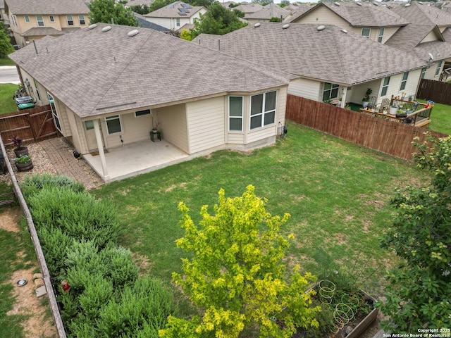 15122 Cinnamon Teal, San Antonio, TX 78253 - back of property featuring a patio area, a shingled roof, and a residential view