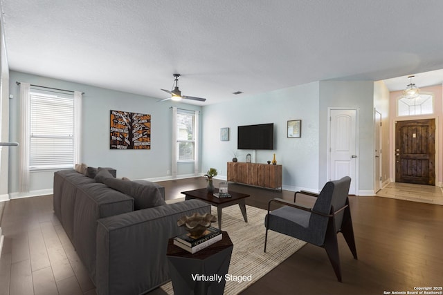 15122 Cinnamon Teal, San Antonio, TX 78253 - living area with hardwood / wood-style floors, ceiling fan, baseboards, and a textured ceiling