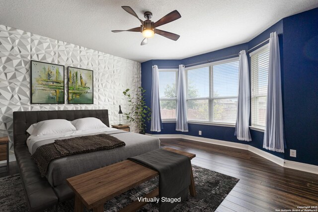 15122 Cinnamon Teal, San Antonio, TX 78253 - bedroom featuring baseboards, wallpapered walls, a textured ceiling, ceiling fan, and hardwood / wood-style floors