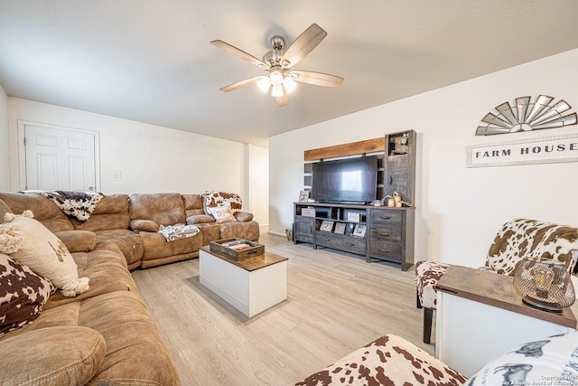 14616 Stable Spgs, Elmendorf, TX 78112 - living area with light wood-style floors and ceiling fan