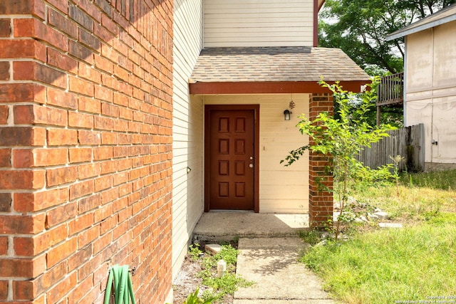7026 Elmbank, San Antonio, TX 78244 - doorway to property with roof with shingles and brick siding