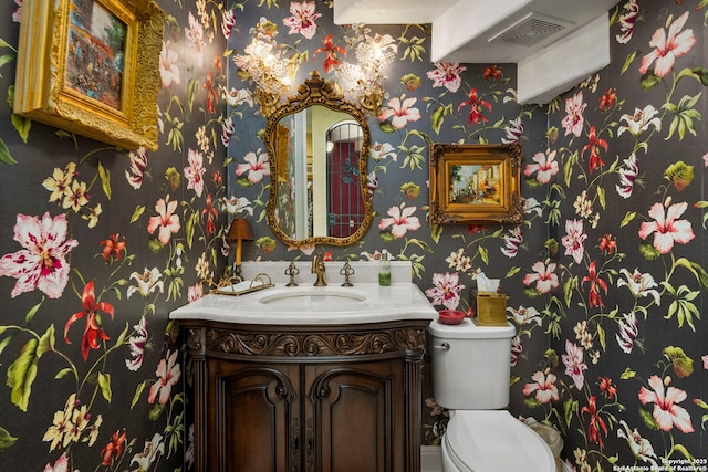 21302 Ronda De Cadiz, San Antonio, TX 78257 - bathroom with wallpapered walls, toilet, and vanity