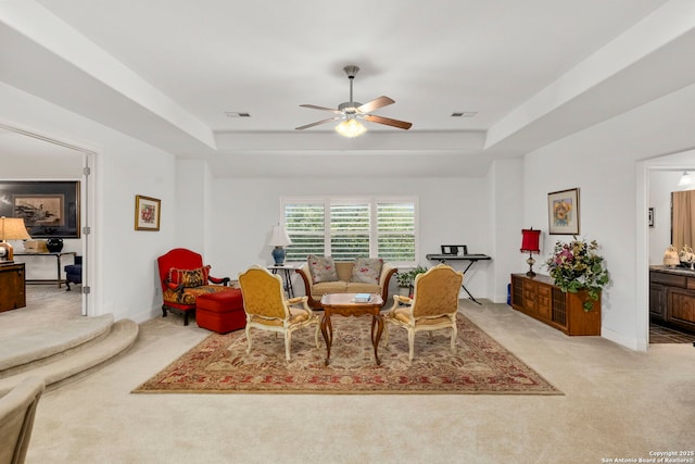 21302 Ronda De Cadiz, San Antonio, TX 78257 - dining area with a raised ceiling, light carpet, ceiling fan, and baseboards