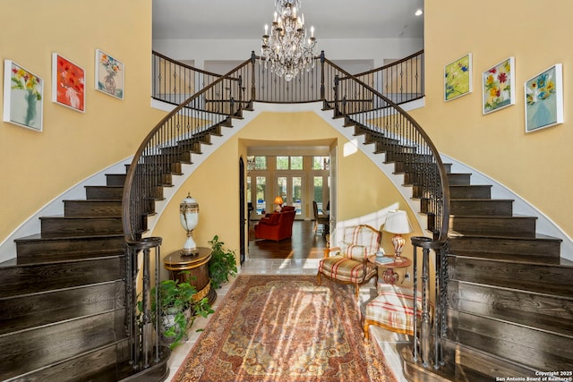 21302 Ronda De Cadiz, San Antonio, TX 78257 - entrance foyer with stairs, a chandelier, and a towering ceiling