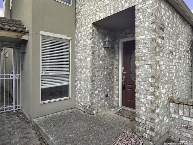 201 Craig Pl Apt B, San Antonio, TX 78212 - view of exterior entry with brick siding