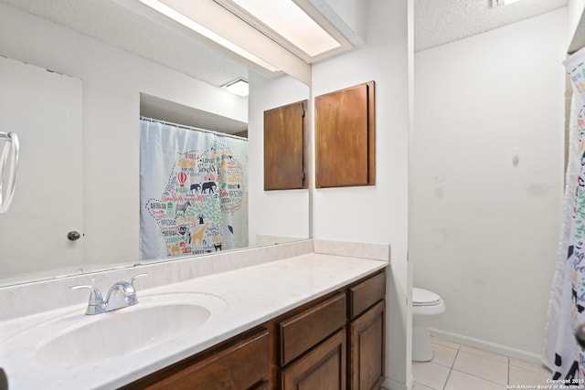 7738 Chambers Rd Unit 1203, San Antonio, TX 78229 - full bath with vanity, tile patterned floors, toilet, a textured ceiling, and a shower with shower curtain