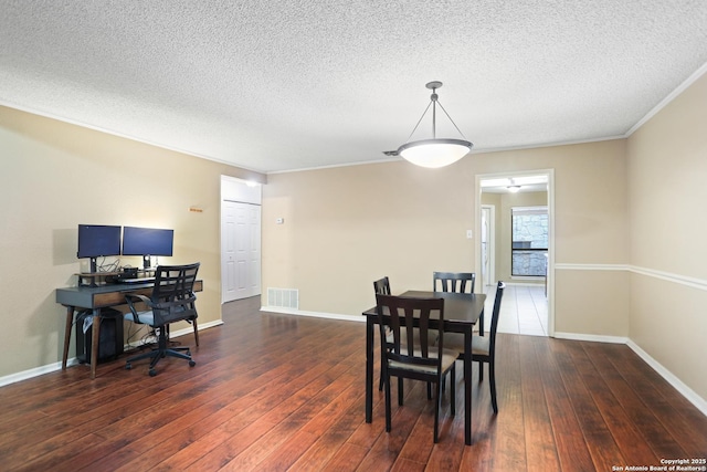 7738 Chambers Rd Unit 1203, San Antonio, TX 78229 - dining space featuring hardwood / wood-style floors, a textured ceiling, baseboards, an office area, and ornamental molding