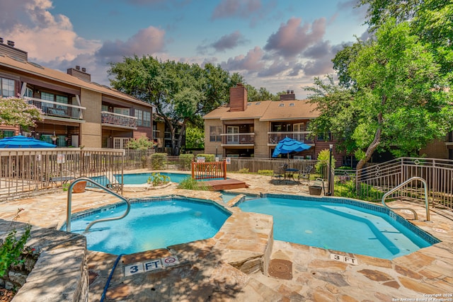 8633 Datapoint Unit 236, San Antonio, TX 78229 - community pool with a hot tub and a patio