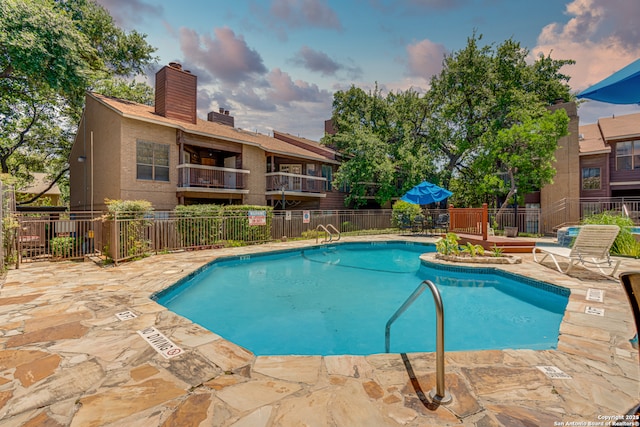 8633 Datapoint Unit 236, San Antonio, TX 78229 - community pool featuring a patio area