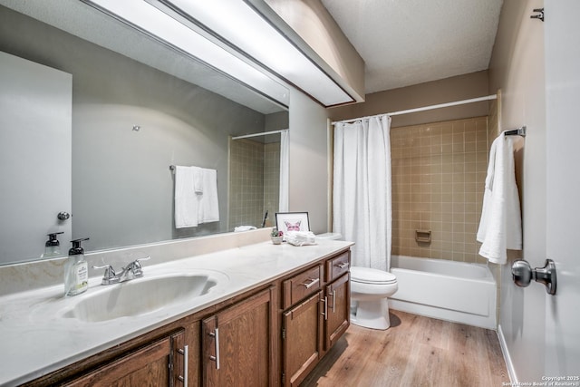 3030 Heidi St, San Antonio, TX 78247 - bathroom with vanity, wood finished floors, toilet, and shower / tub combo with curtain