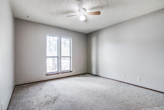 3030 Heidi St, San Antonio, TX 78247 - spare room featuring carpet flooring, ceiling fan, a textured ceiling, and baseboards