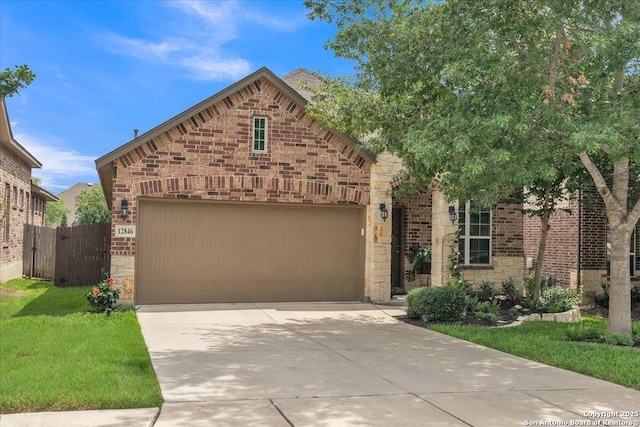 12846 Lone Star Leaf, San Antonio, TX 78253 - view of front of property with an attached garage, driveway, stone siding, and brick siding