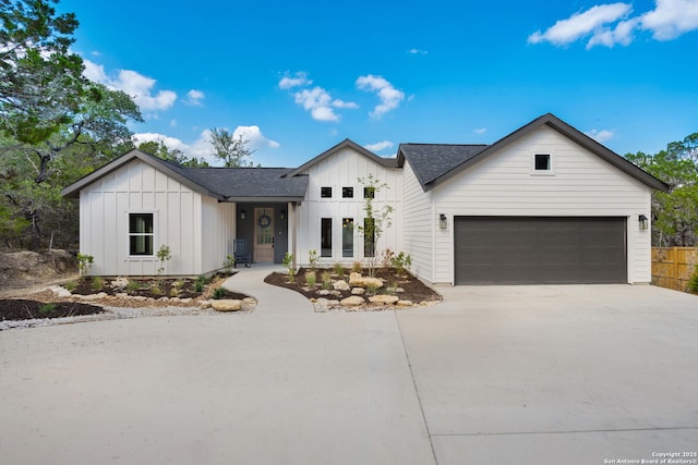 604 Compass Rose, Canyon Lake, TX 78133 - modern farmhouse with board and batten siding, concrete driveway, and a shingled roof