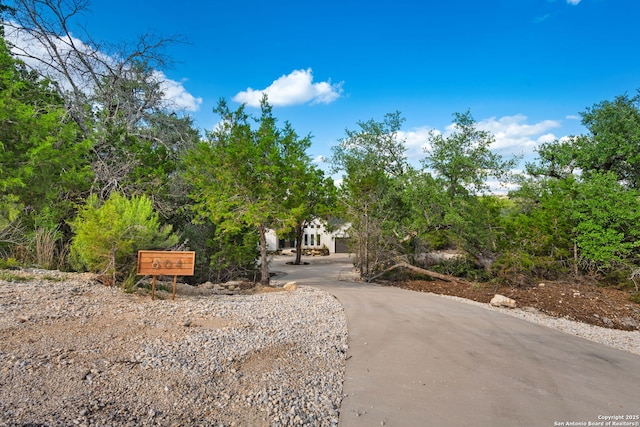 604 Compass Rose, Canyon Lake, TX 78133 - view of home's community with driveway