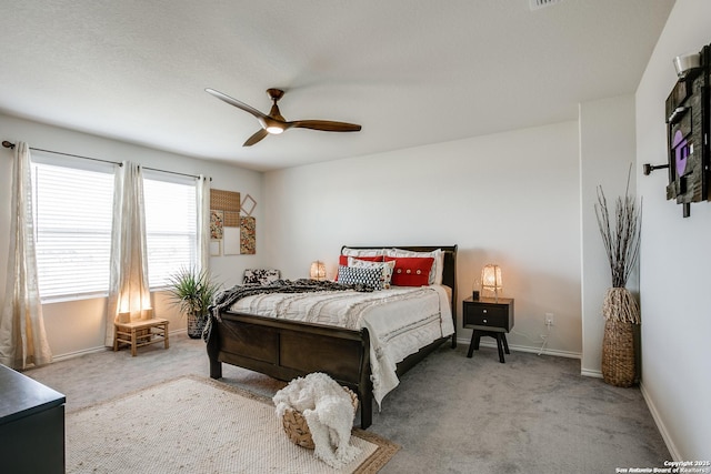9910 Cowboy Ln, San Antonio, TX 78254 - carpeted bedroom featuring baseboards and ceiling fan