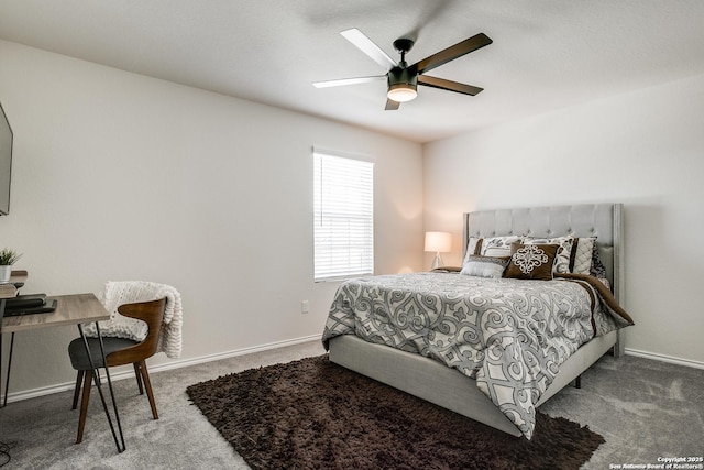 9910 Cowboy Ln, San Antonio, TX 78254 - carpeted bedroom with a desk, baseboards, and ceiling fan