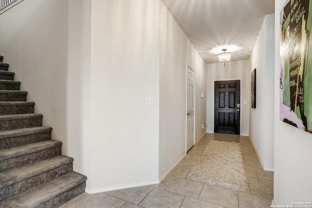 9910 Cowboy Ln, San Antonio, TX 78254 - entrance foyer with stairs, baseboards, and light tile patterned floors