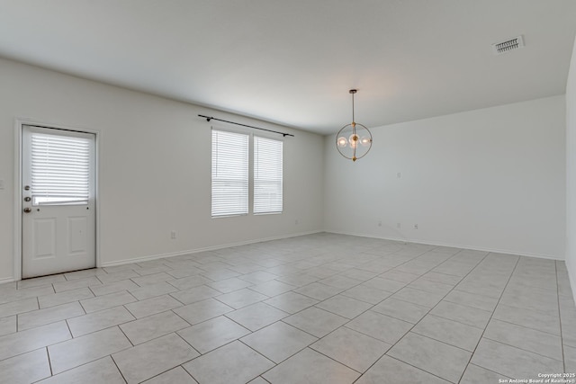 9910 Cowboy Ln, San Antonio, TX 78254 - spare room with healthy amount of natural light, a chandelier, light tile patterned floors, and baseboards