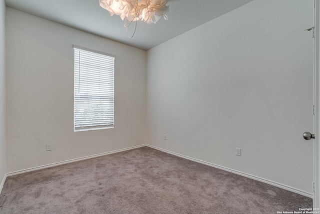 9910 Cowboy Ln, San Antonio, TX 78254 - carpeted spare room with a chandelier and baseboards