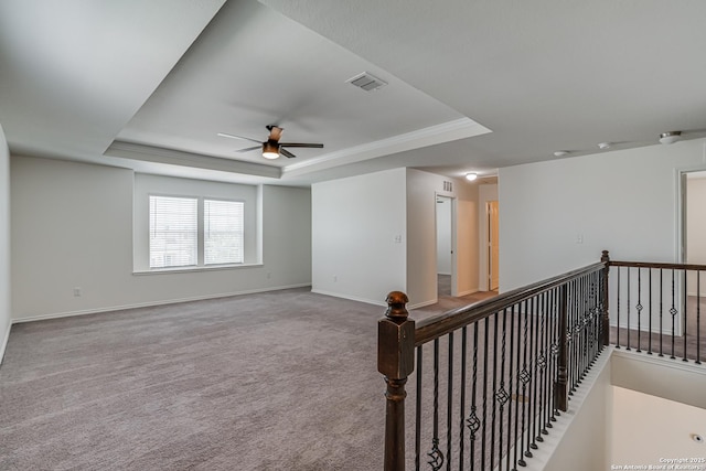 9910 Cowboy Ln, San Antonio, TX 78254 - carpeted empty room with a raised ceiling, a ceiling fan, and baseboards
