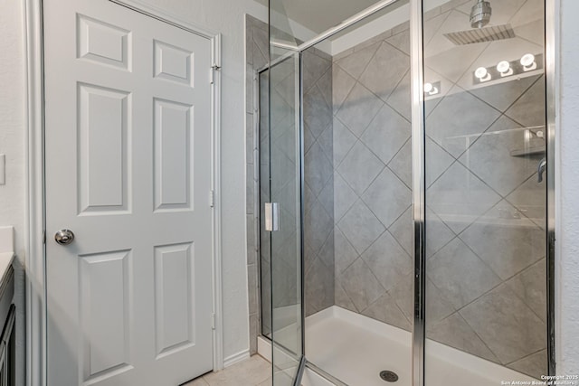 9910 Cowboy Ln, San Antonio, TX 78254 - full bath with a stall shower, vanity, and tile patterned flooring