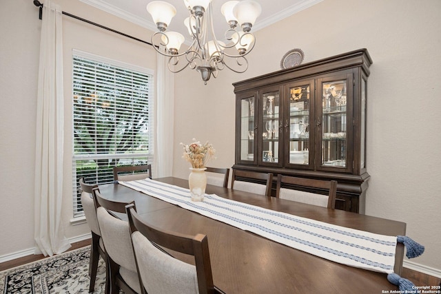 19426 Desert Oak, San Antonio, TX 78258 - dining area with a chandelier, ornamental molding, and wood finished floors