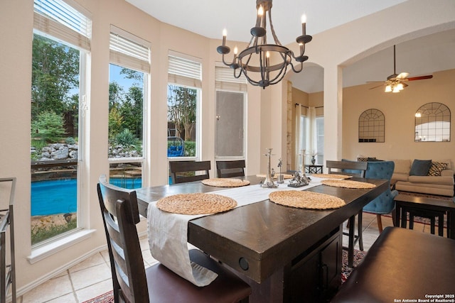 19426 Desert Oak, San Antonio, TX 78258 - dining room featuring healthy amount of natural light, ceiling fan, a chandelier, and light tile patterned floors