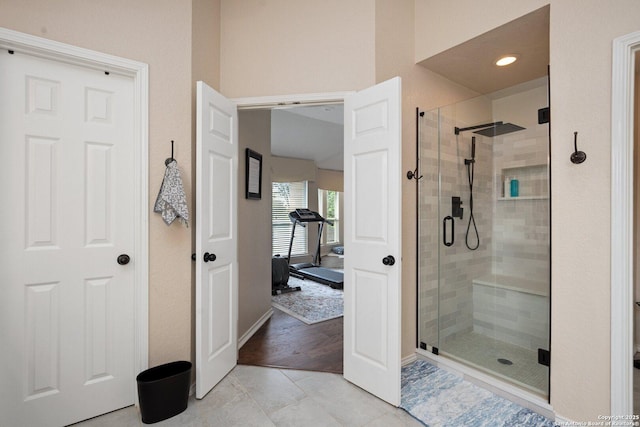 19426 Desert Oak, San Antonio, TX 78258 - full bathroom featuring tile patterned floors, a stall shower, and recessed lighting