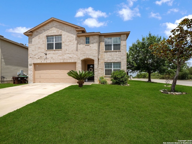 3842 Fiesta Trl, San Antonio, TX 78245 - view of front facade featuring a garage, concrete driveway, a front yard, and brick siding