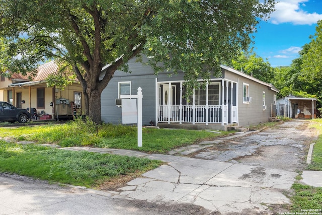 323 Roseborough, San Antonio, TX 78210 - view of front of property with covered porch and asphalt driveway