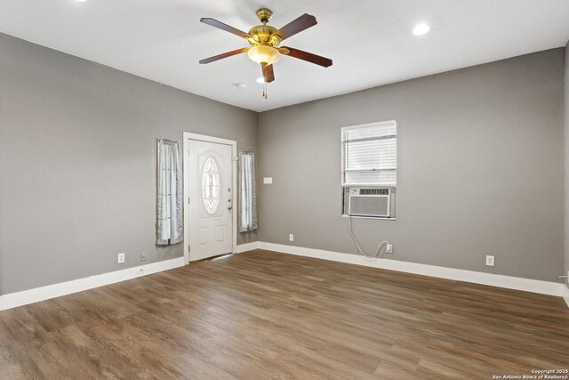 323 Roseborough, San Antonio, TX 78210 - foyer entrance featuring wood finished floors, a ceiling fan, baseboards, recessed lighting, and cooling unit