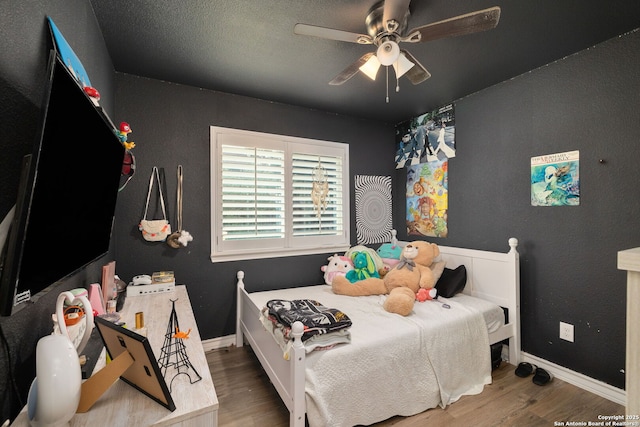9711 Doefield, San Antonio, TX 78250 - bedroom with wood finished floors, baseboards, and ceiling fan