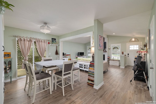 9711 Doefield, San Antonio, TX 78250 - dining area with vaulted ceiling, light wood-type flooring, and baseboards