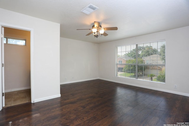 7 Brieley Ln, San Antonio, TX 78250 - empty room featuring ceiling fan, plenty of natural light, and wood finished floors