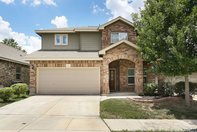1415 Crane Ct, San Antonio, TX 78245 - view of front facade featuring brick siding, an attached garage, and driveway